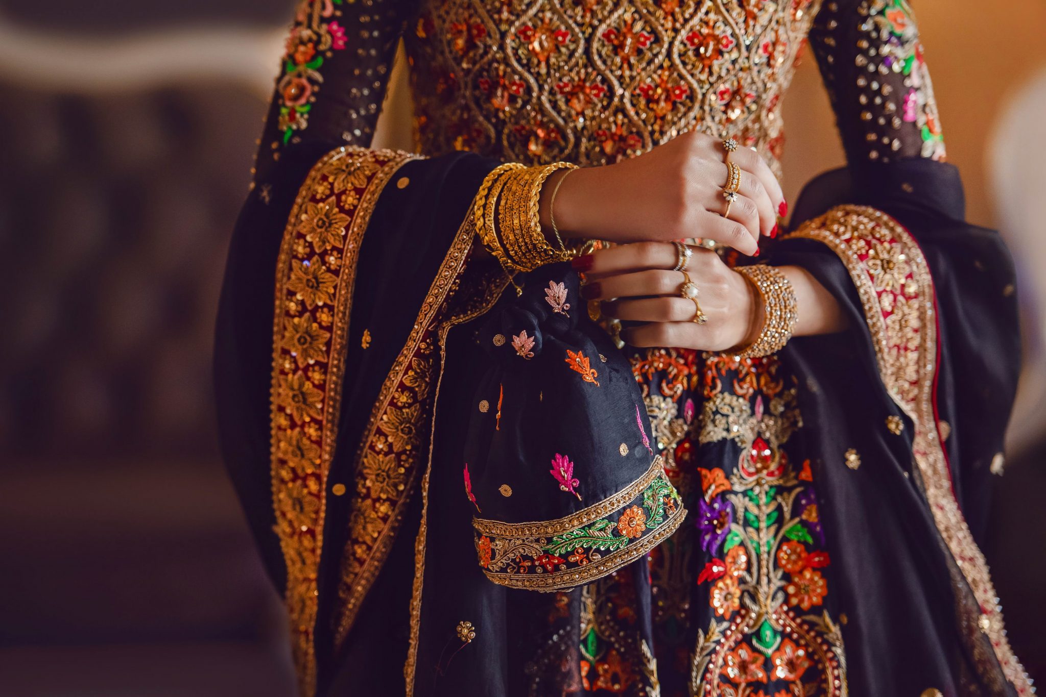 A bride's beautiful wedding outfit with all the gold accessories
