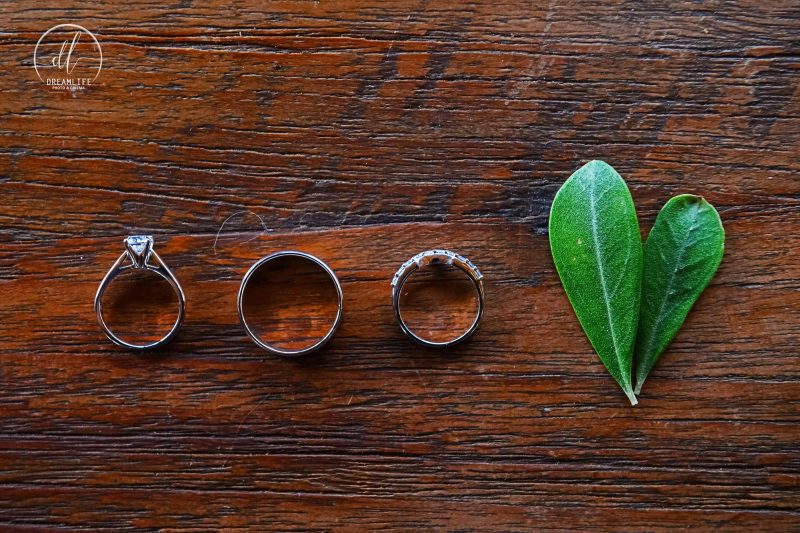 three rings and a heart shaped leaf