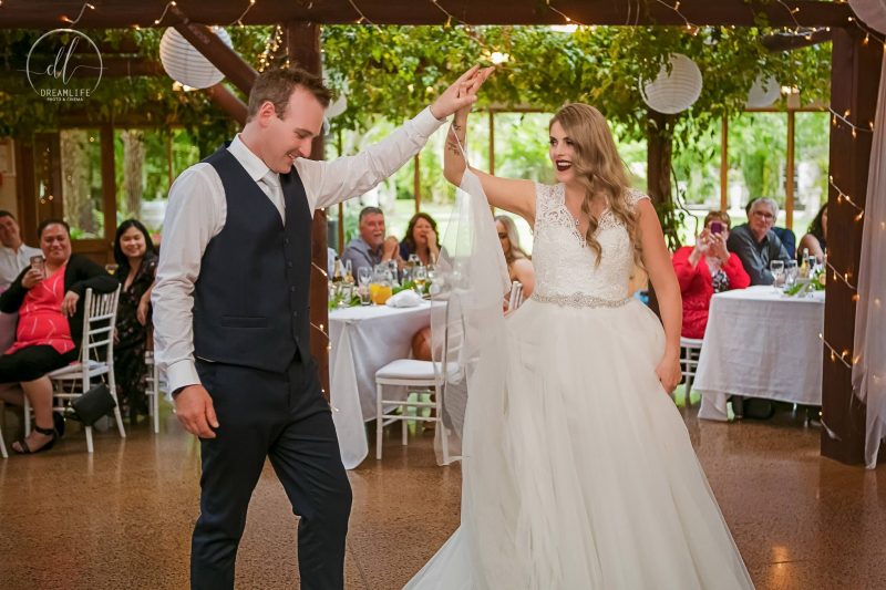 groom and bride dancing in a wedding venue