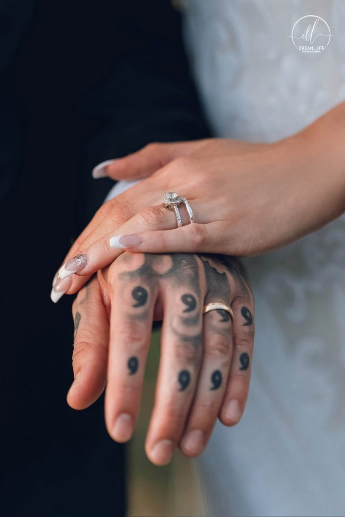 hands of a couple with wedding ring