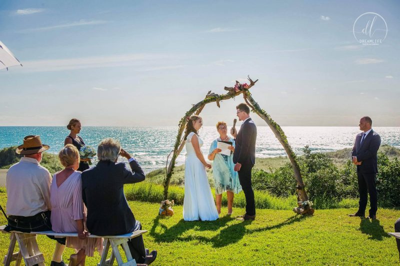 wedding ceremony in an open scenic beach backdrop